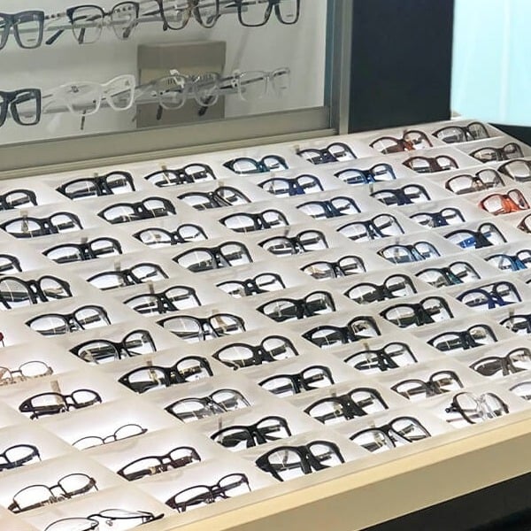 Up-lit retail display for glasses by C-West Custom Fixtures